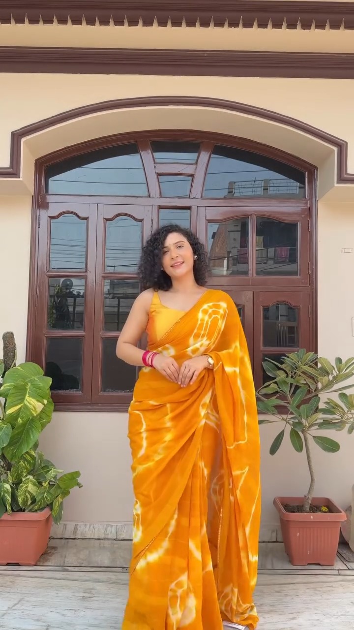 Orange tie-dye saree